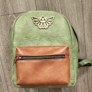 Green and Brown Backpack with Gold Zelda Emblem